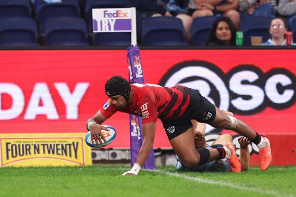 Chay Fihaki of the Crusaders  scores a try. 