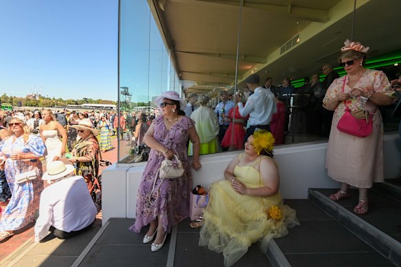 Ladies take a moment to relax in the shade.