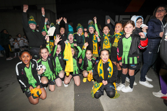 Matildas fans pose before the friendly between Australia and France tonight at Marvel Stadium.