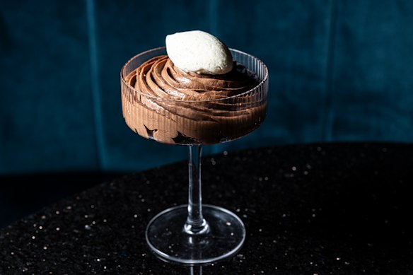 Cointreau-laced chocolate mousse topped with whipped cream.