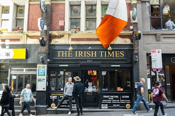 The Irish Times Pub is a long-standing presence at the street’s western end.