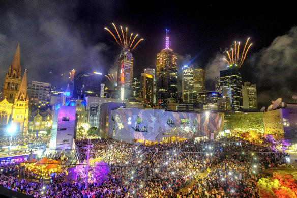 New Year’s Eve fireworks illuminate the sky above Federation Square in 2018.