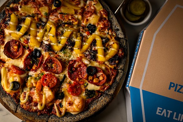The Fantastic Four pizza at Pizza Monster made with black rice.