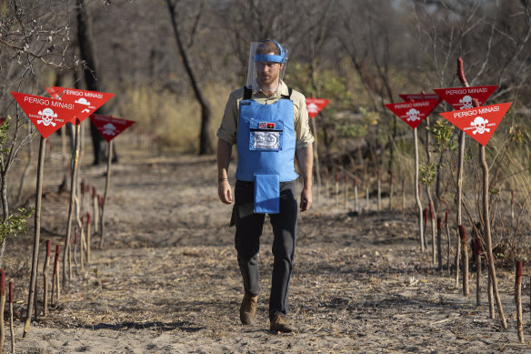 Britain’s Prince Harry walks through a minefield in Dirico, Angola, in 2019.