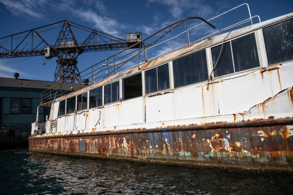 A rusting and derelict vessel near Goat Island. 