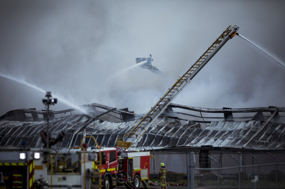 Firefighters battle the blaze at e-waste facility MRI E-Cycle in Melbourne on August 9, 2020.