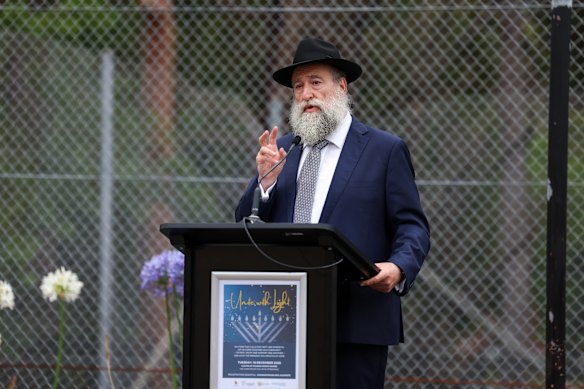 Rabbi Nochum Schapiro speaking on Tuesday night