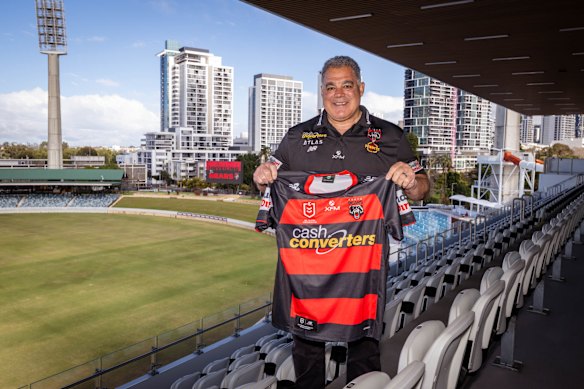 Coach Mal Meninga with the Perth Bears jersey.