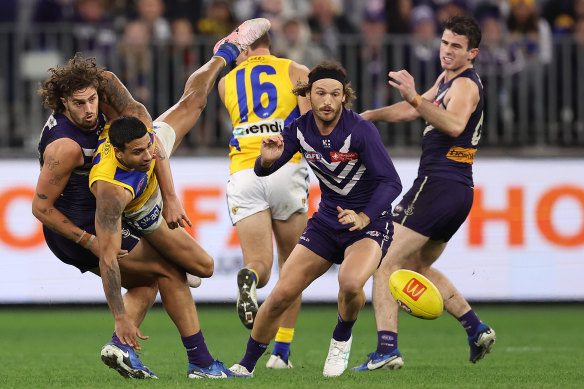 Luke Jackson tackles Tim Kelly.