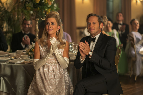 Kristen Wiig (left) plays a socially ambitious woman wanting to break into the Palm Beach social set with her husband, played by Josh Lucas.