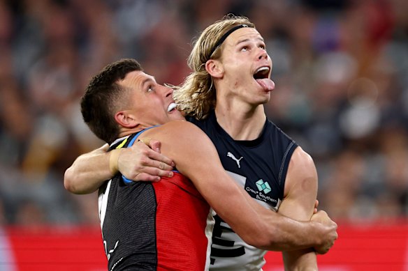 Rowan Marshall of the Saints and Tom De Koning of the Blues compete in the ruck.