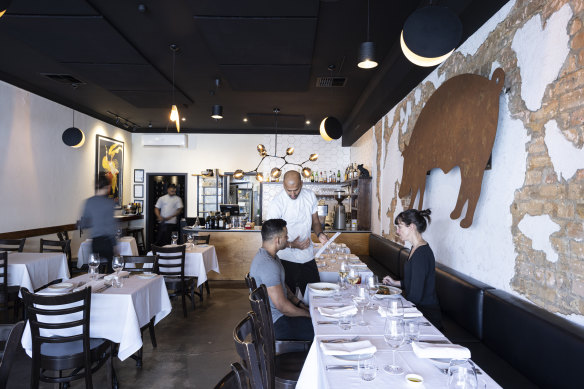Little Black Pig &amp; Sons’ convivial dining room.
