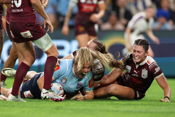 Caitlan Johnston scores for the Sky Blues.