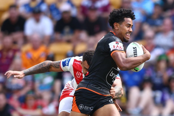 Wests Tigers No. 1 Jahream Bula in action against the Dragons.