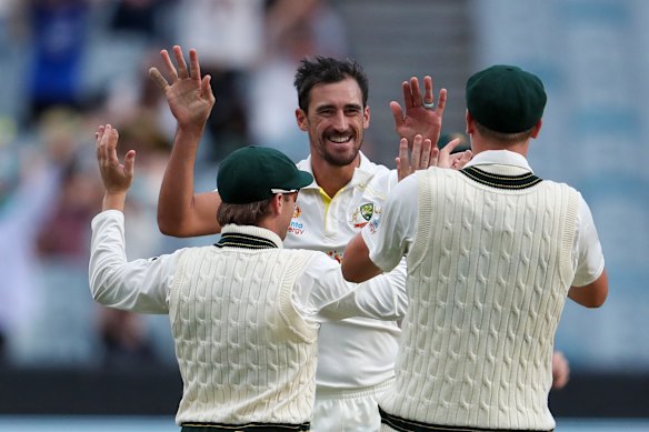 Mitchell Starc celebrates another wicket.