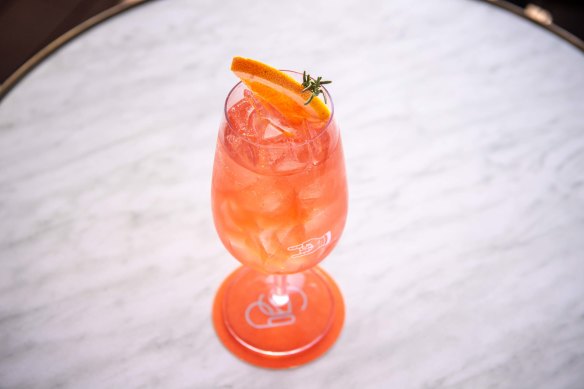 The signature Gigi Spritz is made with red grapefruit aperitif, rose vermouth and bubbles.