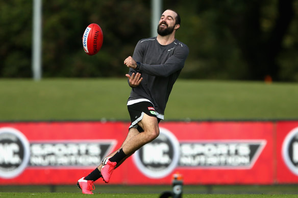 Collingwood's Steele Sidebottom trains in a Melbourne park. Pies coach Nathan Buckley wants as much lead-in time as possible ahead of an AFL return.
