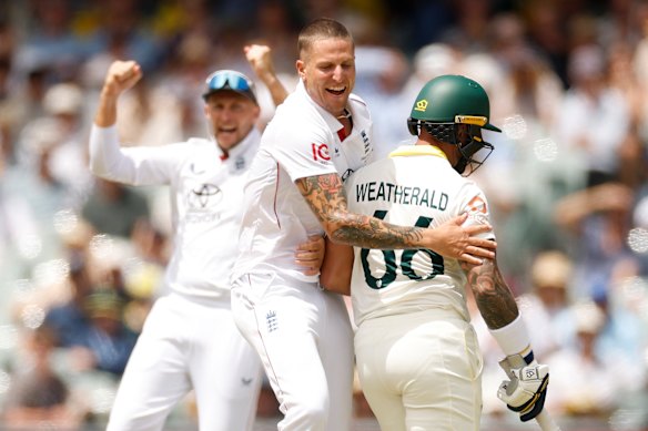 Brydon Carse of England celebrates taking the wicket of Jake Weatherald of Australia.