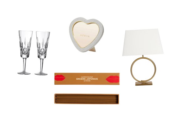 “Lismore” champagne flutes; “Shagreen Heart” frame; “Le Rouge” incense; “Memento Twist Circle” table lamp.  