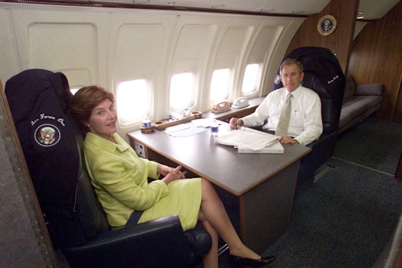 Former president George W. Bush and first lady Laura Bush on board Air Force One in August 2001.