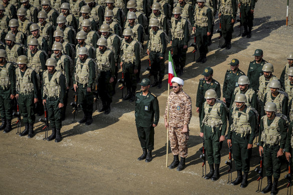 Revolutionary Guard’s ground force troops stand while attending a manoeuvre in north-western Iran last year.