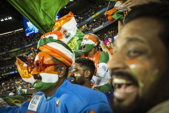 Fans enjoy the atmosphere during the India-Pakistan T20 World Cup match at the MCG in 2022.