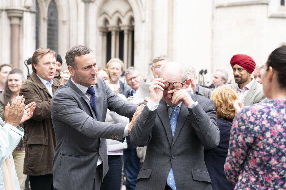 A scene from true crime drama Mr Bates vs The Post Office, showing victimised subpostmasters reacting to a High Court judgment in their favour. 