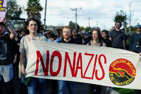 Anti-Nazi protesters march on a gym in Sunshine West in July.