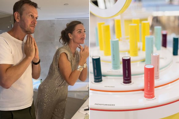 Style editor Damien Woolnough in the bathroom with beauty entrepreneur Trinny Woodall exploring the Trinny London skincare range, on one leg; part of the Trinny London range.