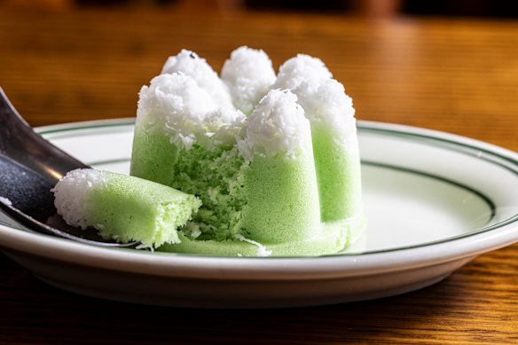 Roemah's putu ayu, pandan sponge topped with grated coconut.