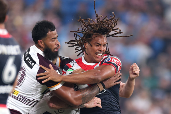 Dominic Young takes on the Broncos.