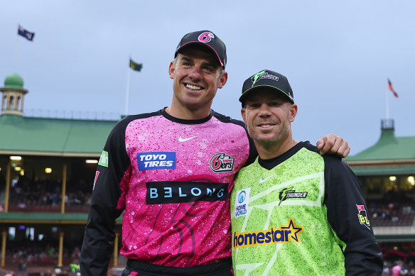 David Warner of the Sydney Thunder and Moises Henriques of the Sydney Sixers.