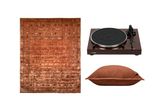 “Shabargan Rust” rug; “TD 202″ turntable; floor cushion.  