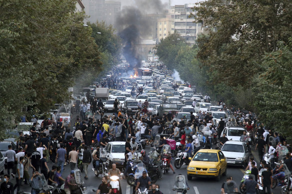 A protest over the death of a woman who was detained by the morality police, in downtown Tehran, Iran.