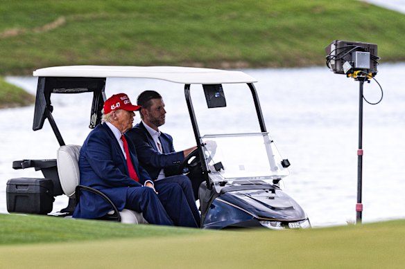 President Donald Trump and son Eric at the LIV Golf Miami at Trump National Doral Miami in April.