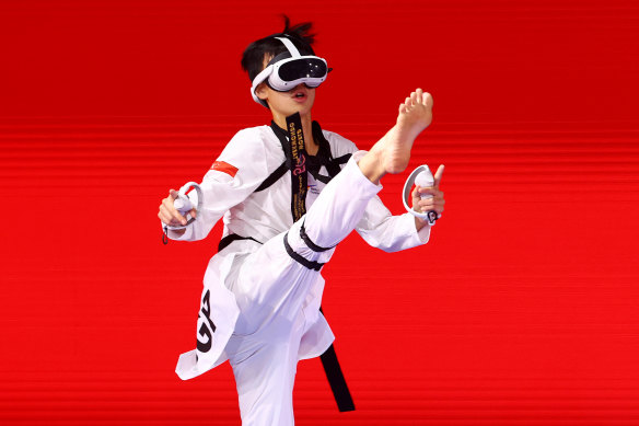 Nigel Tan of Team Singapore competes in the virtual taekwondo event at Olympic Esports Week. 