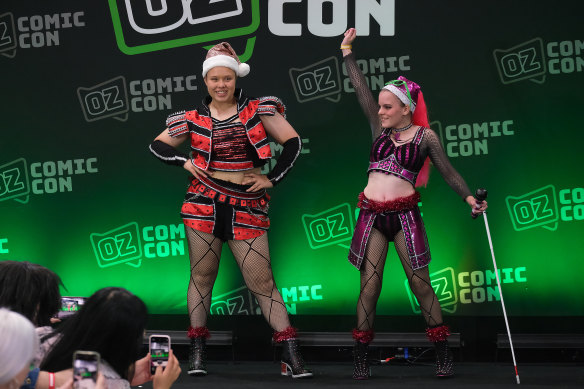 Cosplay competitors take the stage in the Christmas costume event.