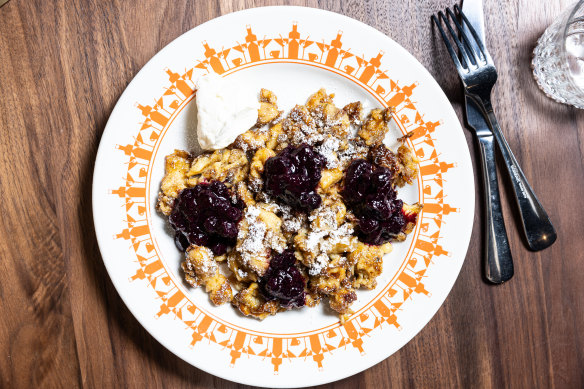 Kaiserschmarrn (scrambled pancakes) with blueberry compote.