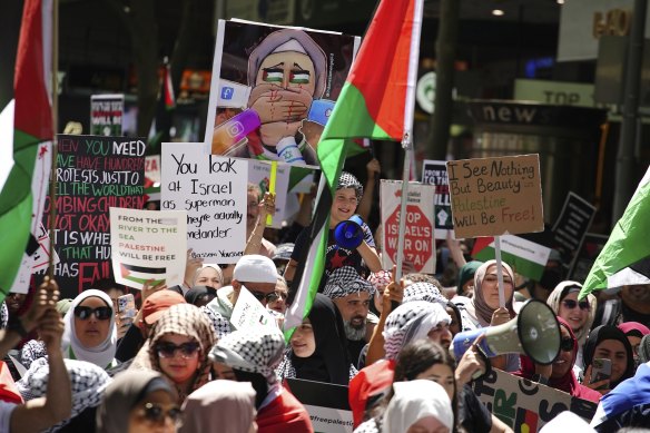 People attend a pro-Palestine rally in Melbourne in late October.