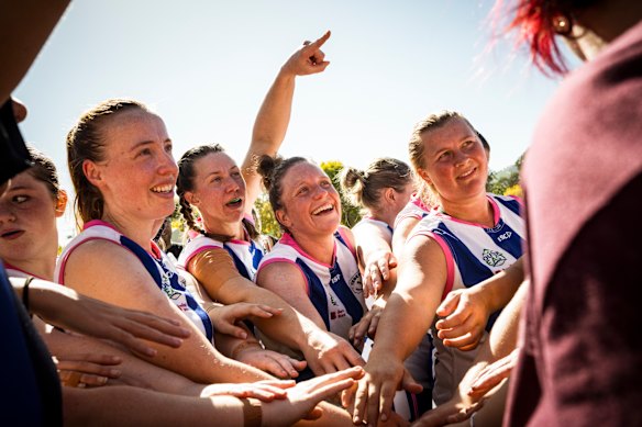 Captain Siobhan Bell revs up her players during quarter time.