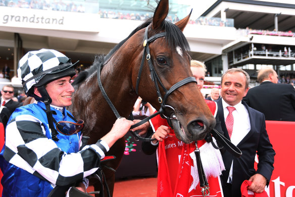 Ryan Moore winning the 2014 Melbourne Cup with Protectionist