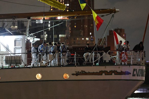 Crew members aboard the Cuauhtémoc, a masted Mexican Navy training ship, gather on deck after the ship collided with the Brooklyn Bridge.