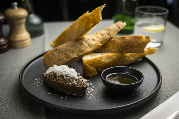 The namesake tapenade is served with focaccia.