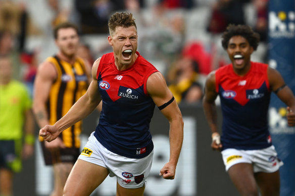 Jake Melksham of the Demons celebrates kicking a goal in round five. 