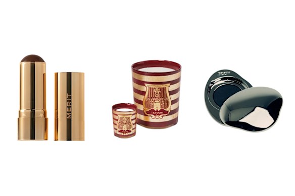 Merit Bronze Balm Sheer Bronzer; Balmain x Trudon Ernesto candle; Fluff Refillable Lip Oil.