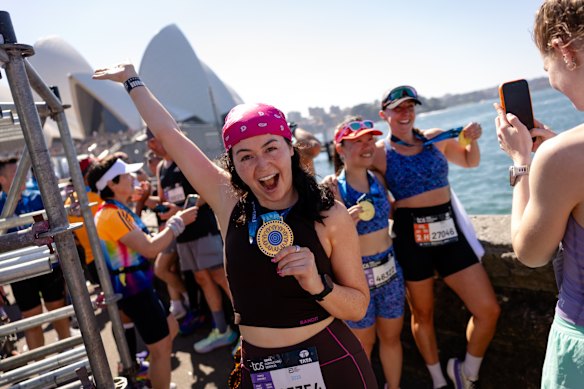 42km later, Abby Seaman reaches the Opera House.