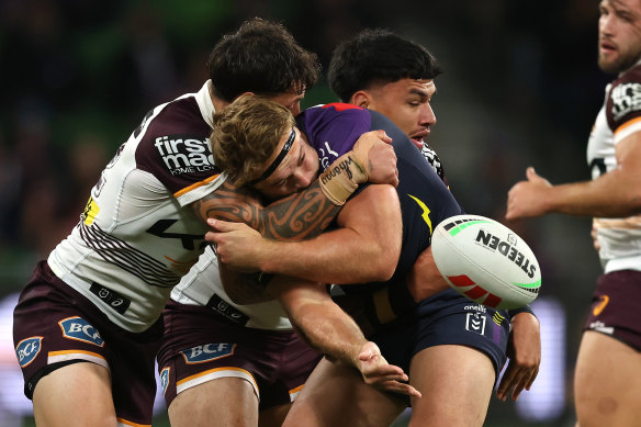 Melbourne Storm prop Christian Welch makes a pass this season.