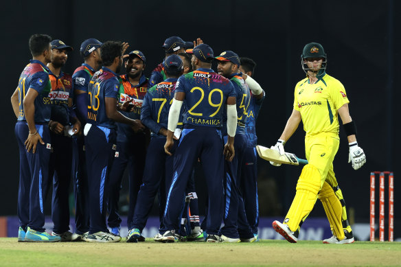 Sri Lankan players celebrate Steve Smith’s wicket during the second T20 match in Colombo. 