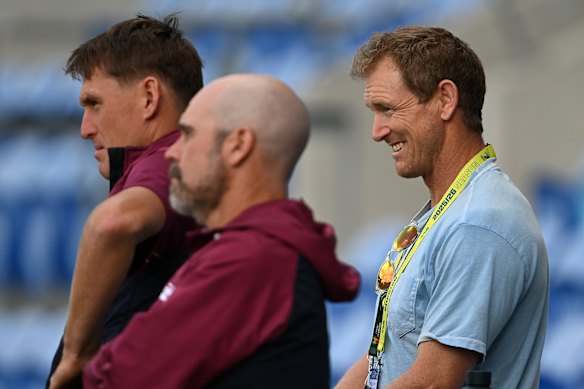 George Bailey (right) watches on during a recent Sheffield Shield match in Hobart.