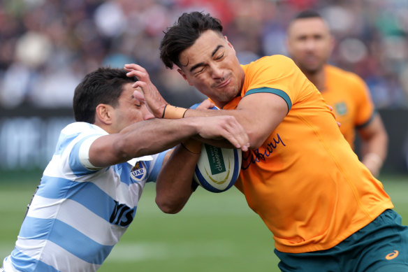 Tackles such as this one on Jordan Petaia could be a thing of the past under new World Rugby laws.